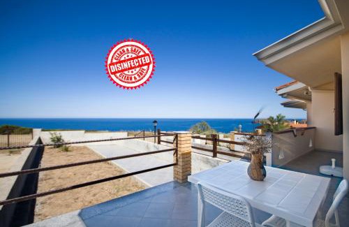 Arbus Casa | CASA VITALIA- SUPER Vista Mare-2 camere -Giardino-BBQ - WiFi FREE-Parcheggio IUNP5732