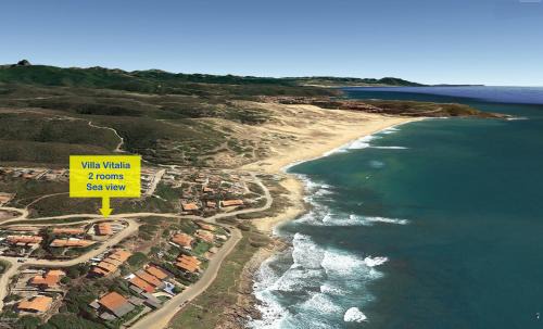 Arbus Casa | CASA VITALIA- SUPER Vista Mare-2 camere -Giardino-BBQ - WiFi FREE-Parcheggio IUNP5732
