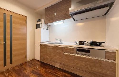 Hiroshima City Centre Apartamento | Casaen by b hotel - Secure 1BR Apt with Dining & Living Space