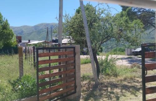 Huerta Grande Casa | Casas HG-Desayuno sencillo entregado al check in-Pileta climatizada en predio a 2 kilómetros-Acepta mascotas bajo petición-Cochera para 1 auto