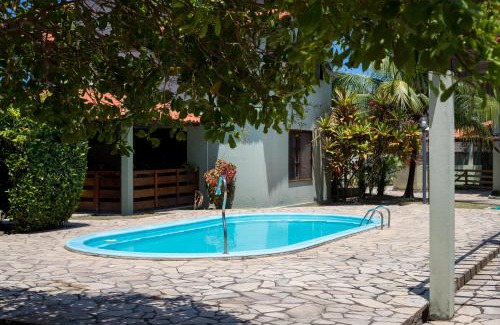 Barra Mar Casa | Casasveraneio casa top com 3 suítes com ar condicionado a 100 m da Praia - Barra de São Miguel, 7 minutos do gunga e 3 da praia bonita e conchas ! Área gourmet particular com churrasqueira , chuveirão !condomínio com muito verde,piscina de 10m!