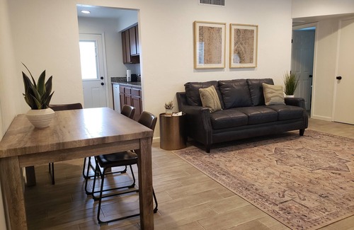 Limberlost Casa | Casita B: Private fenced yard with turf, grill, outdoor dining and seating.