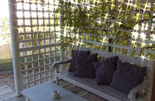 El Palmar Cabaña | Casita Chau, elegante casa de madera de 1 dormitorio.