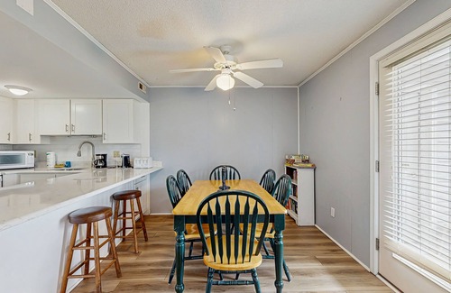 Ocean View Condominio | Cedar Shores condo with shared pool, private balcony, WiFi, & stunning bay views