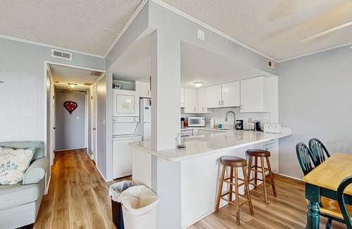 Ocean View Condominio | Cedar Shores condo with shared pool, private balcony, WiFi, & stunning bay views