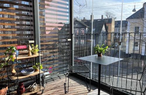 Frederiksberg C Apartamento | Central family home in award-winning architecture
