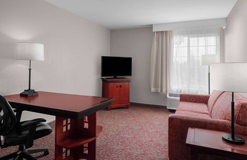 Downtown Hotel | Central Location: 1BR Suite w/ Full Kitchen & Balcony - Complimentary Amenities