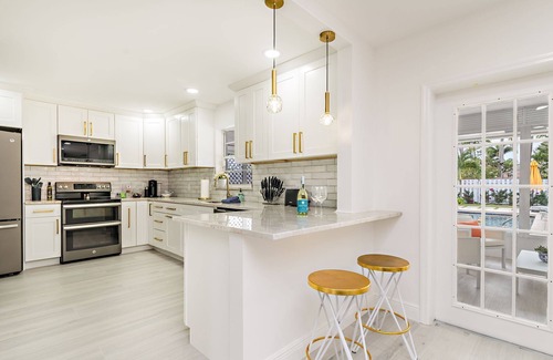 Parrot Cove Casa | Centrally located luxe poolside oasis w/ standout amenities!