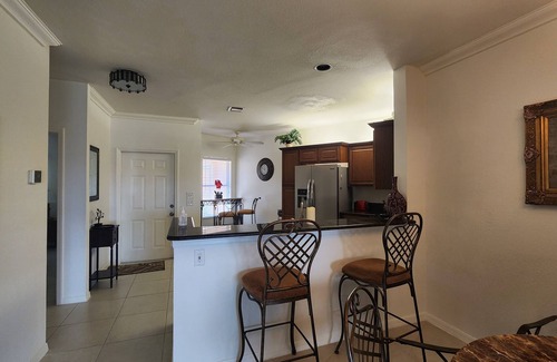 Central Naples Condominio | Centrally located Beautiful First Floor 2/2 Condo w/ Garage minutes from Beach!