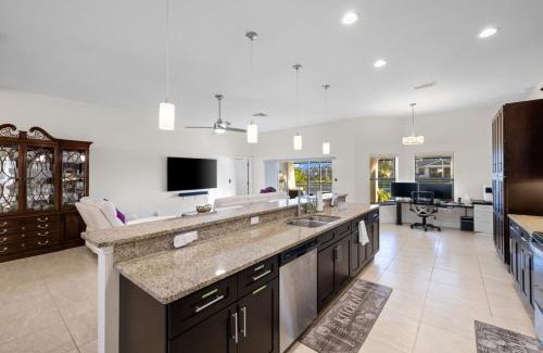 Pelican Casa | Centrally Located - Waterfront Pool Home Convenient Location