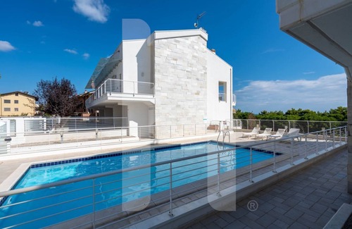 Foggetta Apartamento | Cerrano Park B07 - Ponente - Apartment with garden and terrace with seaview