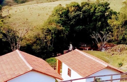 Bueno Brandao Cabina | Chalés Cachoeira Cafundó