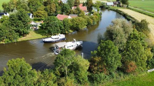 Oostrum Chalet De Esquí | Chalet aan het water - vakantiepark de Schreiershoek