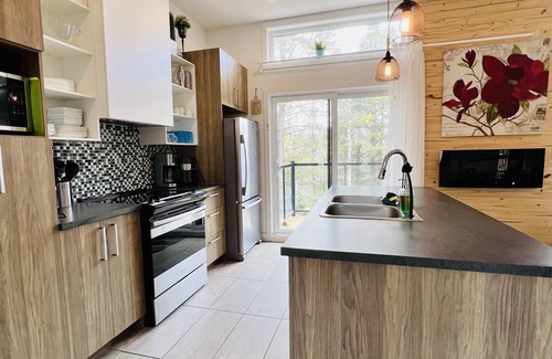 Chertsey Casa | Chalet Atlantide au bord du Lac and Spa