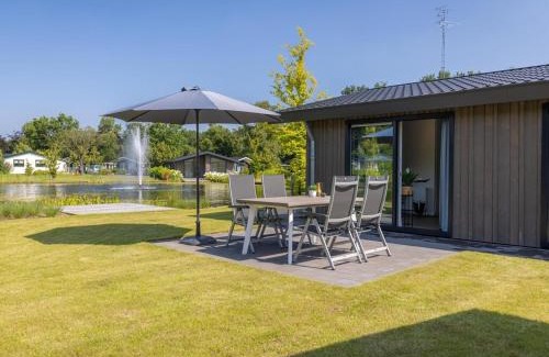 Municipality of Veldhoven Chalet De Esquí | Chalet by Pond in Eindhoven Holiday Park