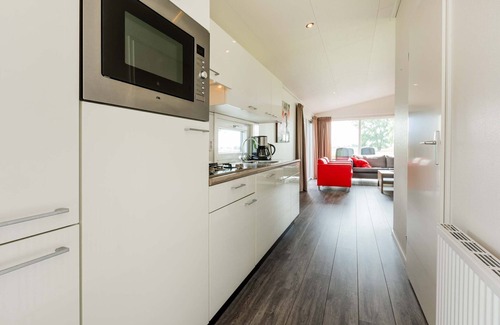 Aalst Chalet De Esquí | Chalet in a holiday park in a wetland area