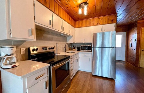 Stevensville Casa | Chalet on the Lake 60 w/ Beach Access, Pools, Sport Courts, Fishing Pond & more!