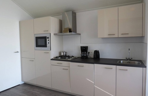 Municipality of Stede Broec Casa | Chalet situated at the waterfront with terrace
