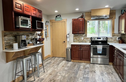 Coram Casa | Chalet tucked in the woods 7 miles from Glacier National Park.