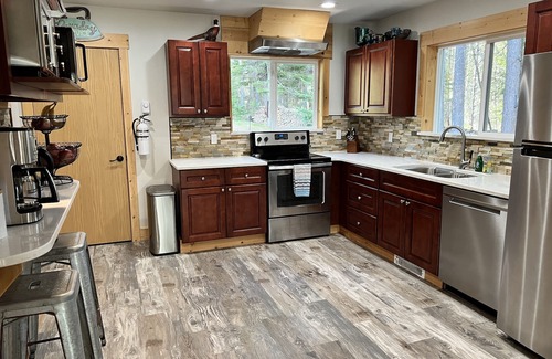 Coram Casa | Chalet tucked in the woods 7 miles from Glacier National Park.