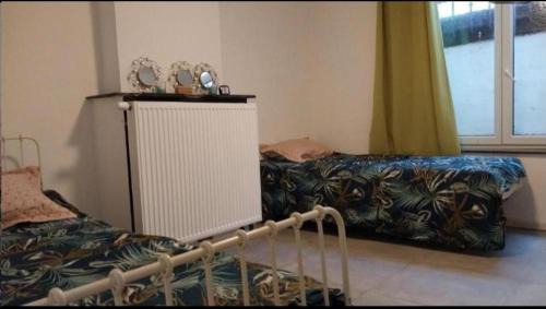 Collignon Casa | Chambre 2lit célibataire schaarbeek sous-sol
