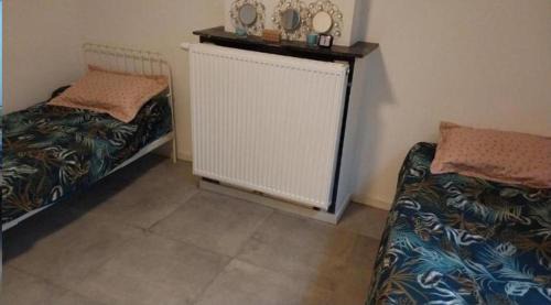 Collignon Casa | Chambre 2lit célibataire schaarbeek sous-sol