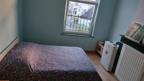 Collignon Casa | Chambre confortable avec un lit double à schaerbeek cle bleu
