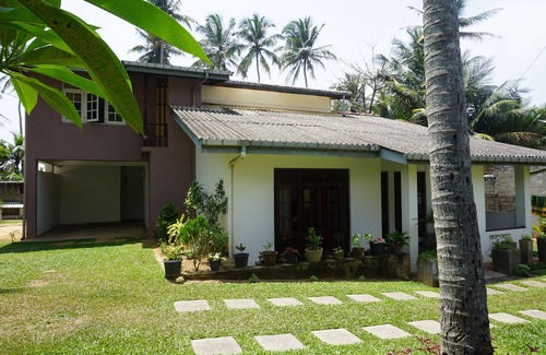 Ambalangoda Casa | Champtil Ambalangoda, Large house with garden next to the beach and sea.