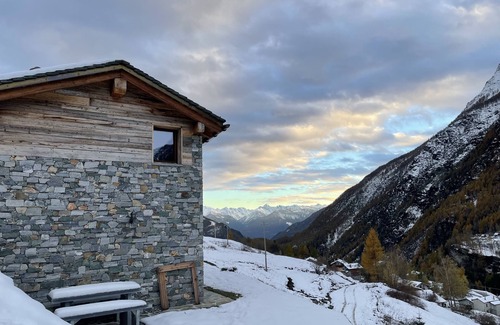 Chiesa in Valmalenco Cabina | Characteristic lodge surrounded by nature near the ski facilities.