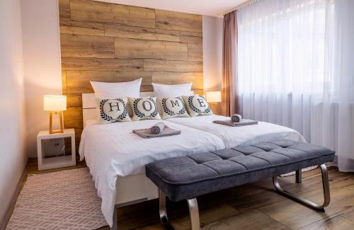Schiffweiler Apartamento | Charmante Design-Maisonette in Schiffweiler - 2 Etagen - Self-Check-in - 2 Parkplätze - WLAN - Balkon & Garten - ruhig gelegen - Nähe See & Wald - bis 7 Pers