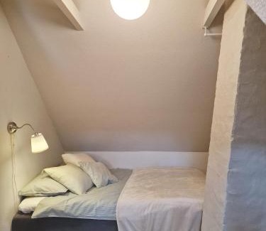 Ronne Apartamento | Charmerende lejlighed i den gamle kirkesmedje