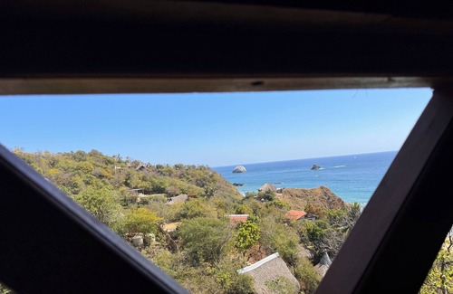 San Agustinillo Apartamento | Charming 1-bedroom apartment garden and ocean view San Agustinillo with AC