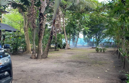 Dumaguete Casa | Charming 2-bedroom beach house with AC, WiFi in delightful Bacong