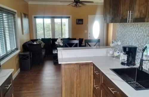 Tar Bay Cabaña | Charming 2-bedroom cottage with AC, WiFi, . Two-minute walk to beach.