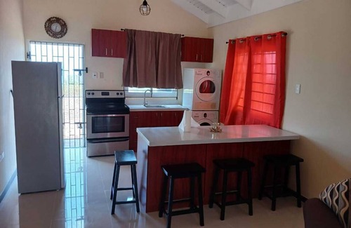 St.Bran's Burg Casa | Charming 2-bedroom house with AC, WiFi in marvelous Montego Bay