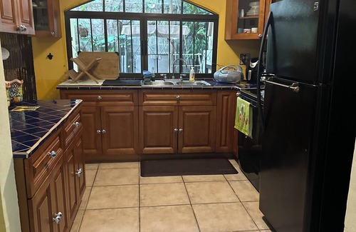 Heredia Casa | Charming 2-bedroom townhome in welcoming Heredia with WiFi, AC in walkable town