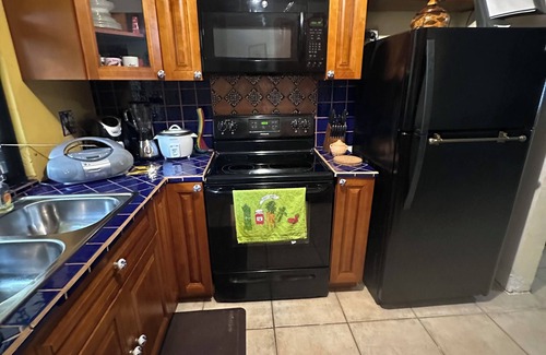 Heredia Casa | Charming 2-bedroom townhome in welcoming Heredia with WiFi, AC in walkable town