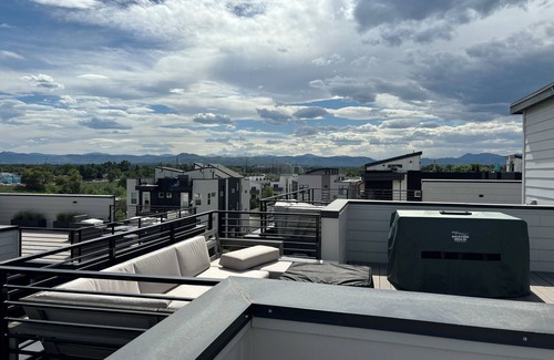 West Colfax Casa | Charming 2-bedroom townhome with superb rooftop patio views, AC, and internet