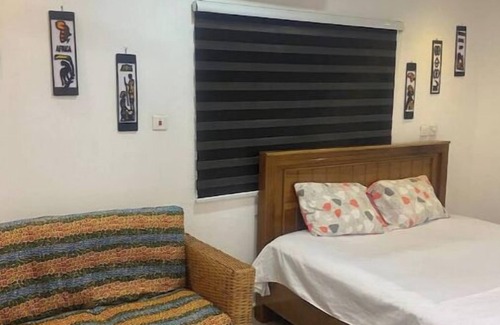 Komenda Cama Y Desayuno | Charming 3-bedroom bed & breakfast in cool Elmina with AC