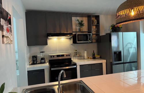Puerto Barillas Casa | Charming 3-bedroom house with AC, WiFi in lovely San Miguel