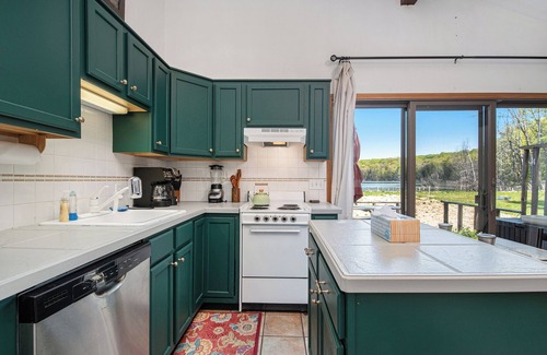 Gaylord Casa | Charming 3-bedroom Lakefront Home - Tons of Amenities like Firepits and WiFi