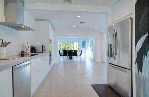 Central Business District Casa | Charming 3-bedroom bungalow with Heated pool in Oakland Park/ Fort Lauderdale.
