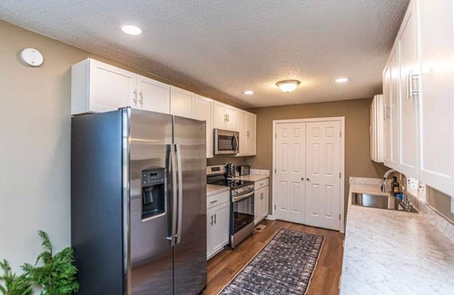 Covington Casa | Charming 3-BR Retreat, Hot Tub, EV, close to Blue Oval City