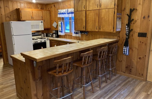 Lac du Flambeau Cabaña | Charming and Cozy, 4-Season, Fence Lake Cottage with Beautiful Sunset View