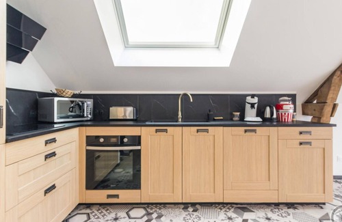 Parigny Apartamento | Apartamento con terraza, cocina equipada y juegos, a 38 km del Mont-Saint-Michel.