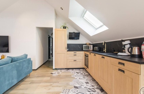Parigny Apartamento | Apartamento con terraza, cocina equipada y juegos, a 38 km del Mont-Saint-Michel.
