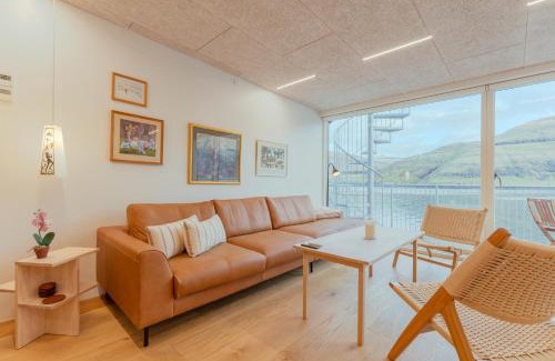 Vestmanna Apartamento | Charming Boathouse with Panoramic Fjord Views