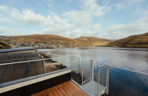 Vestmanna Apartamento | Charming Boathouse with Panoramic Fjord Views