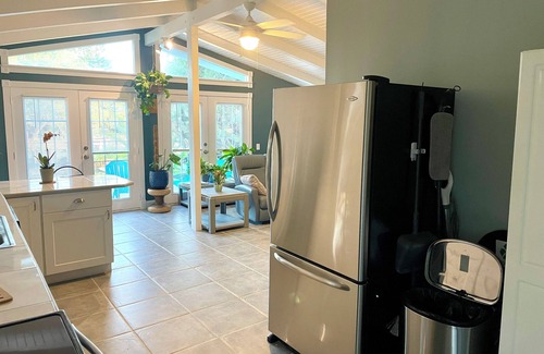 Butler Beach Casa | Charming Canal Front Cottage! Walk to the Beach!
