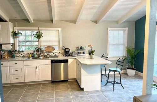 Butler Beach Casa | Charming Canal Front Cottage! Walk to the Beach!